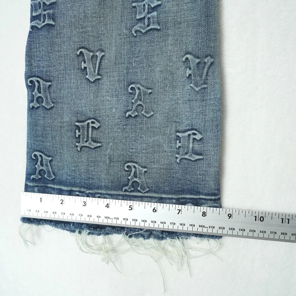 Valabasas Mens Monogram Embossed Carpenter Stacked Flare Jeans Blue Size 30